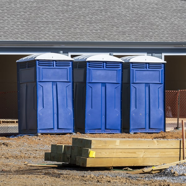 are there any additional fees associated with portable restroom delivery and pickup in Bates City